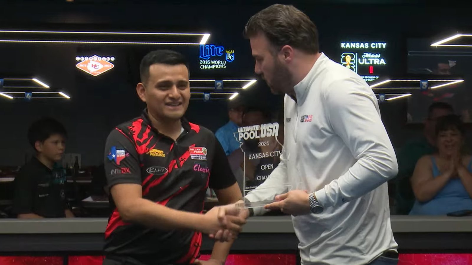 Gerson Martinez receiving the 2026 Kansas City Open champion trophy